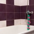 Reimagining Bathrooms With Sustainable Tiles and Water-Efficient Fixtures